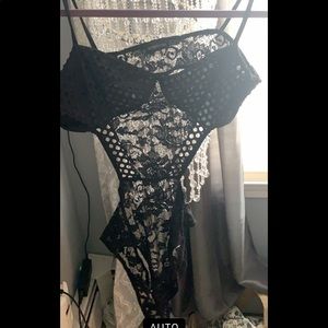 Pretty little thing Black lace cut out bodysuit